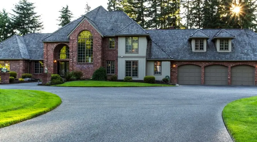 brick house with spacious driveway
