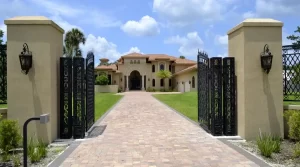 long driveway with big open gates
